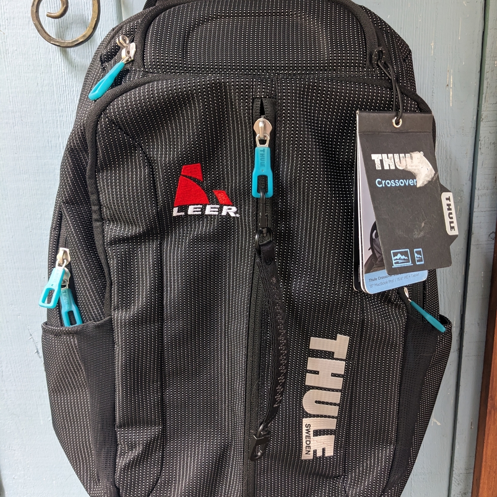 Thule Black Backpack with Blue Accents